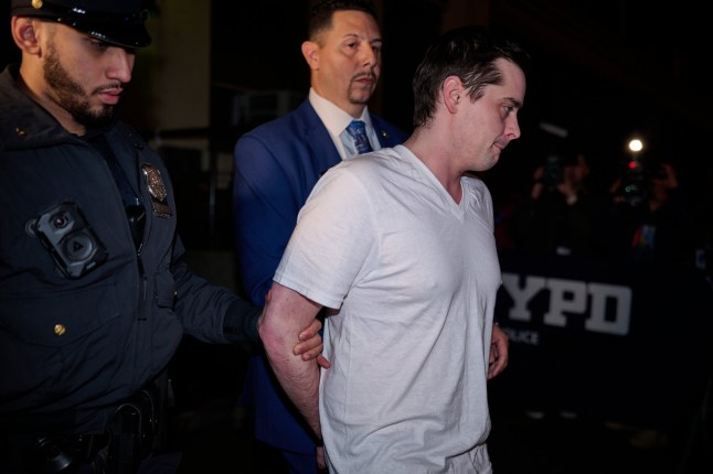 14745663 Inside SoHo apartment of horrors where sadistic man 'tortured tourist with chainsaw for WEEKS to get his crypto passwords' John Woeltz, 37, of Kentucky, is walked out of the 5th precnct after he was arrested for holding an Italian tourist hostage whom he had had a falling out with and torturing him for 2 weeks as he tried to steal his cryto fortune. The tourist managed to escape the townhouse at 38 Prince street in SOHO and flag down a cop who then effected the arrest.